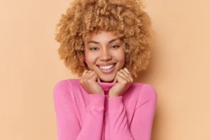 Curly beautiful woman smiling