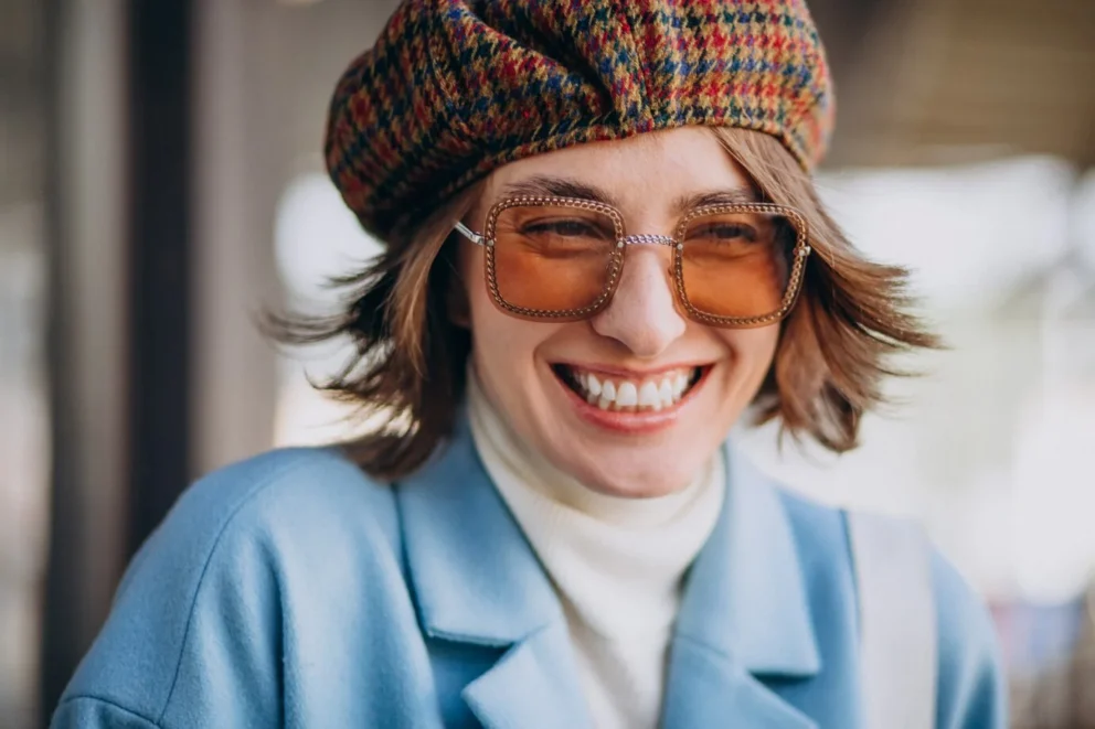 portrait-young-woman-sunglasses-hat_1303-20455